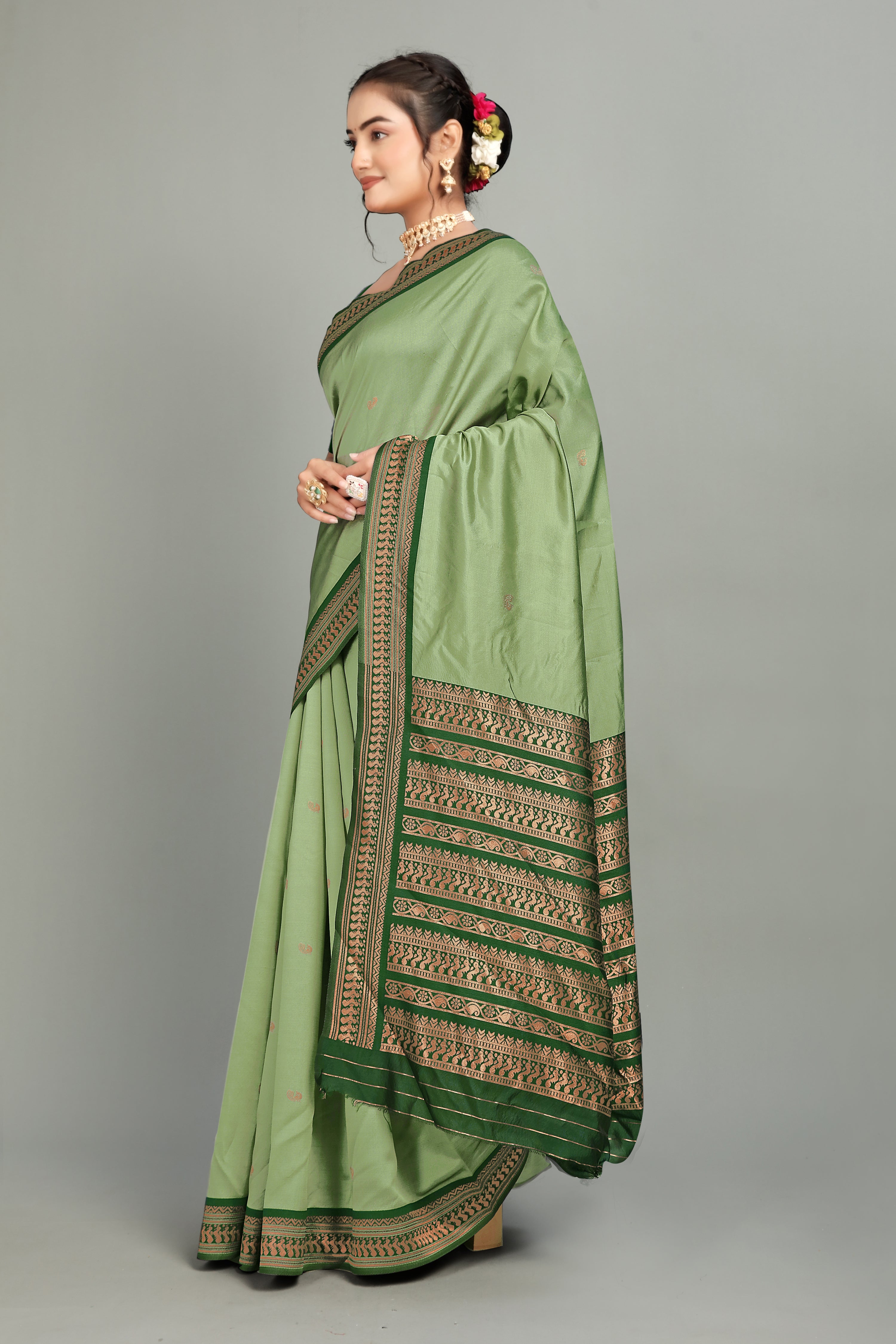 Green Solid Woven Silk Saree