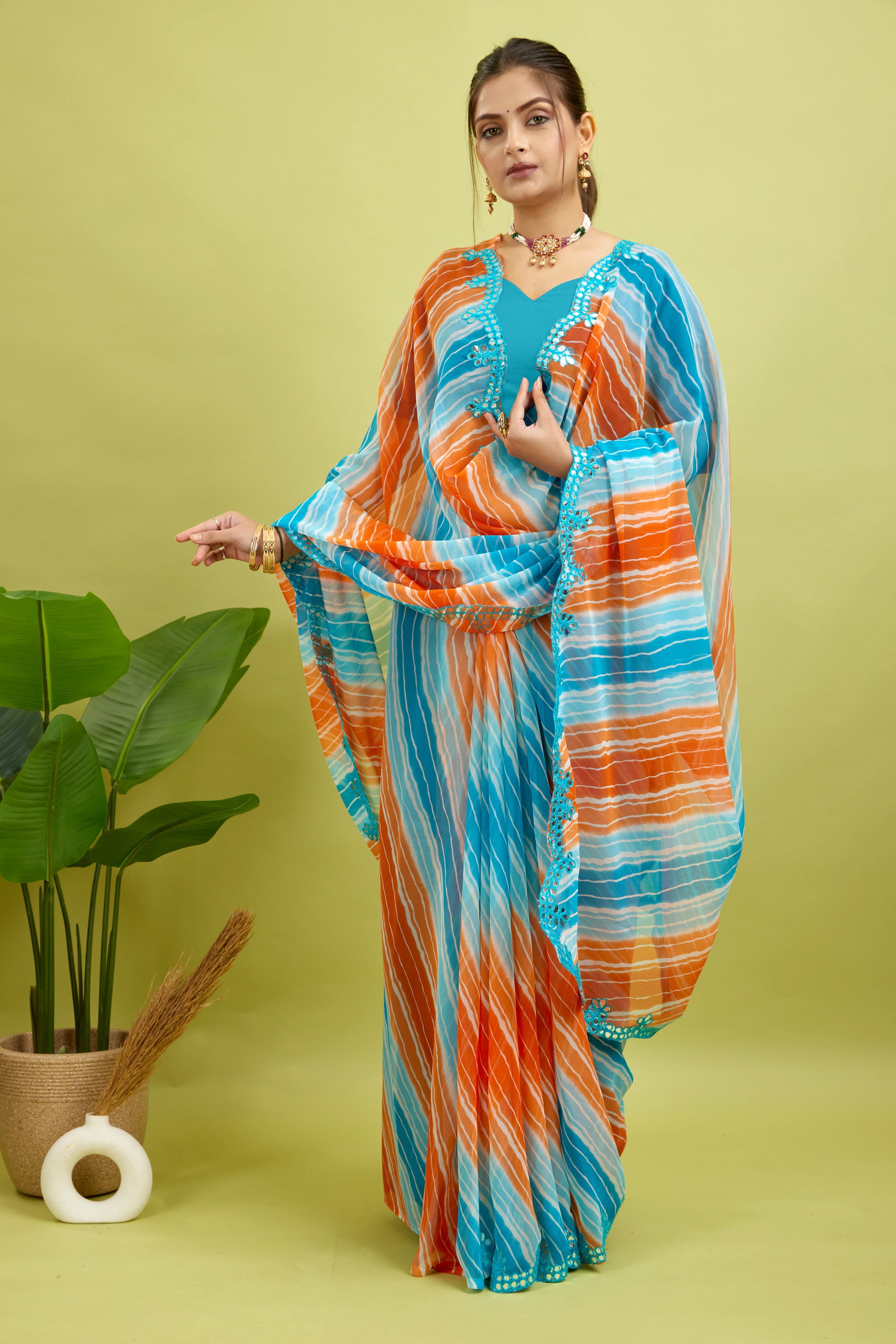 Orange Foil Work Border Georgette saree
