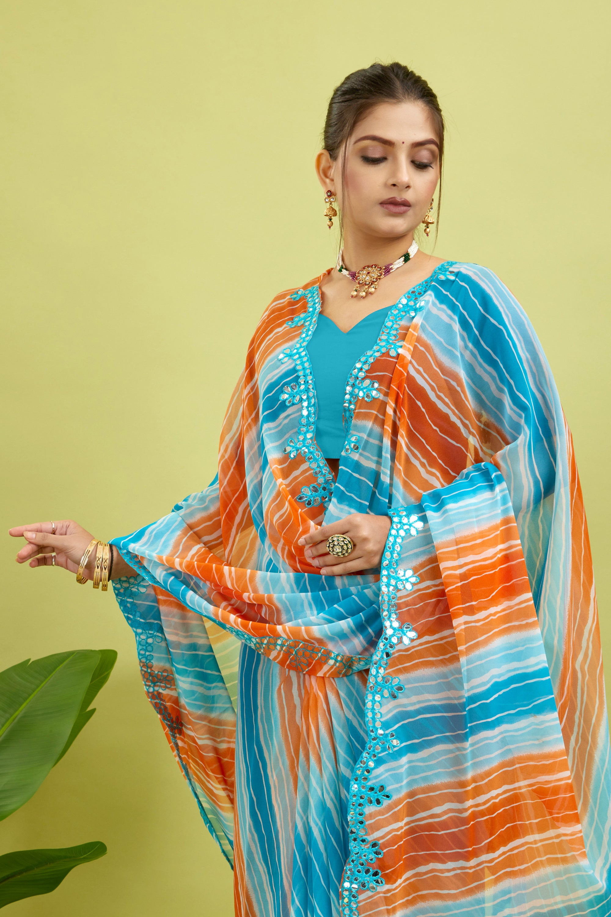 Orange Foil Work Border Georgette saree